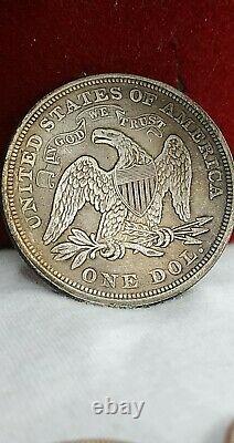 1869 seated liberty dollar