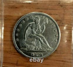 1876 seated liberty half dollar. Near mint. About uncirculated