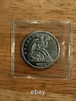 1876 seated liberty half dollar. Near mint. About uncirculated