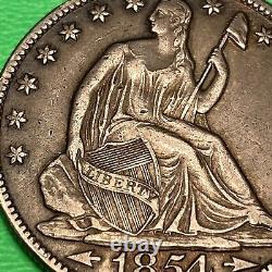 (1) Beau demi-dollar en argent assis de 1854-O avec une belle patine foncée XF CHOICE