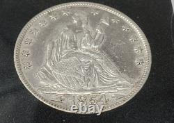 1854 Demi-dollar assis de la Liberté avec des flèches, en état presque non circulé (AU)