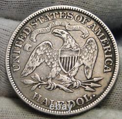 1873 Seated Liberty Demi-dollar