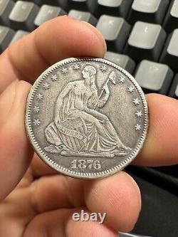 1876-CC Demi-Dollar Assis XF Superbe Pièce