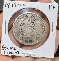 1877-CC Demi-dollar à l'effigie de la Liberté assise, F+ Aspect original agréable